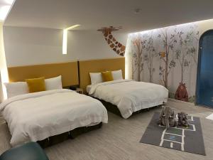 Voodi või voodid majutusasutuse Ya Nold Hot Spring Hotel toas