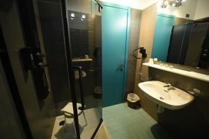 Koupelna v ubytování Hotel Celis