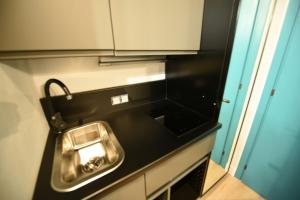 Kuchyň nebo kuchyňský kout v ubytování Hotel Celis