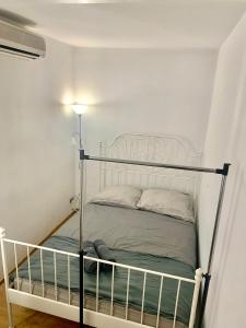 A bed or beds in a room at Comfy, nice and small room in Krakow 5