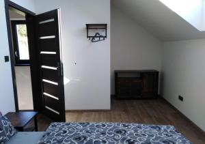 Letto o letti in una camera di Apartmány Jakubov