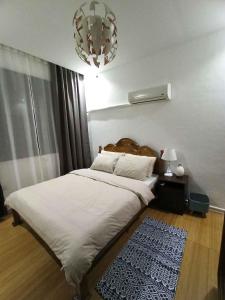 Postel nebo postele na pokoji v ubytování RLJ Beach House + 37 fotografií