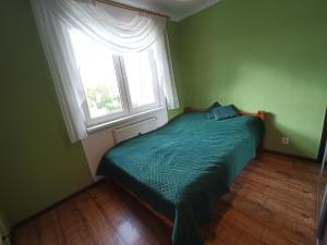 Postel nebo postele na pokoji v ubytování 3-Pokojowy Apartament Olsztyn Dadleza