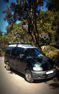 a black van parked on the side of a road at Beautiful Campervan to Rent in Santa Cruz de Tenerife