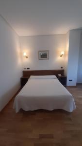 Posteľ alebo postele v izbe v ubytovaní Hotel Las Moreras