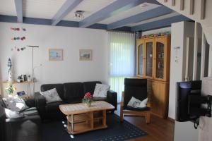 Posezení v ubytování Ferienhaus Besken