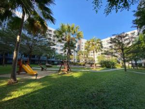 a park with a playground with a slide at Elio Del Ray condo feel resort in Bangkok