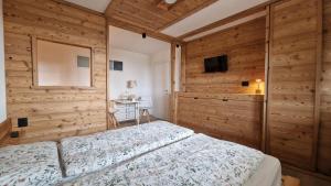 Postel nebo postele na pokoji v ubytování Guest House Dolomiti