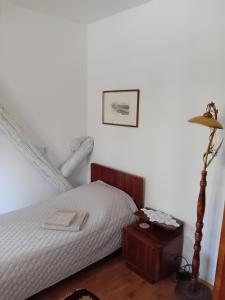 Postel nebo postele na pokoji v ubytování Lucha apartman