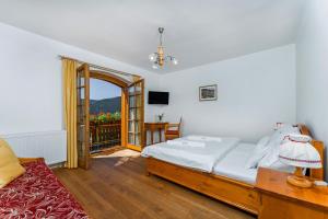 Posteľ alebo postele v izbe v ubytovaní Pension Happy Superior