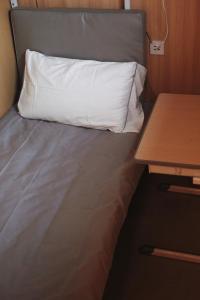 Letto o letti in una camera di Suzhou MeetU Intl Youth Hostel