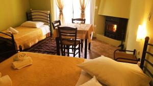 Posteľ alebo postele v izbe v ubytovaní Guesthouse Eleftherios