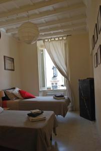 Lova arba lovos apgyvendinimo įstaigoje Appartamento Piazza Farnese