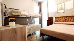 Postel nebo postele na pokoji v ubytování Gli Ulivi Rooms