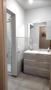 Ένα μπάνιο στο Gli Ulivi Rooms