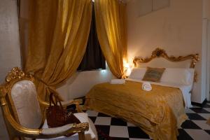 מיטה או מיטות בחדר ב-San Giorgio Rooms