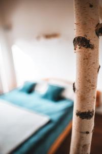 Łóżko lub łóżka w pokoju w obiekcie Villa Bergl.21