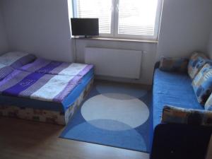 Postel nebo postele na pokoji v ubytování Penzion Apartmány Zlín