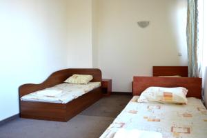 מיטה או מיטות בחדר ב-Hotel Sozopol