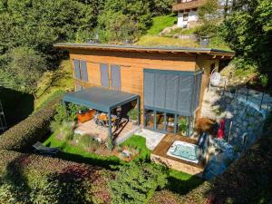 an overhead view of a tiny house with a pool at Villa Bergl.21 in Brixlegg