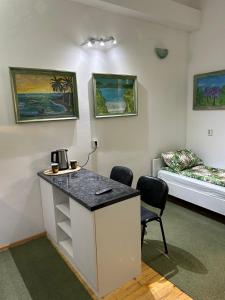Kuchyň nebo kuchyňský kout v ubytování Guesthouse Hurma Rooms