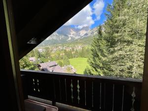 a view from the balcony of a resort with mountains at CHALET STRAVEDO in Villanova