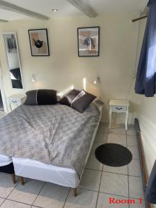 Postel nebo postele na pokoji v ubytování Bak Guesthouse + 20 fotografií