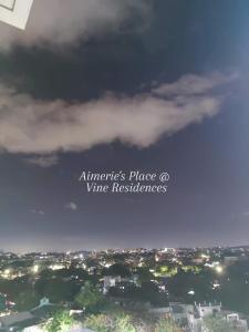 a view of a city under a cloudy sky at Vine Residences -Cozy 2BR with Balcony in Manila