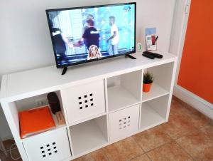 A television and/or entertainment centre at Agata Views