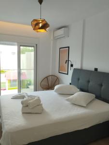 Postel nebo postele na pokoji v ubytování Iris pool House