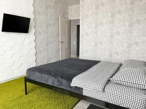 Ένα ή περισσότερα κρεβάτια σε δωμάτιο στο 0238 квартира ЖК Щасливий, укриття в комплексі