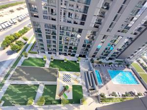 Fotografie z fotogalerie ubytování New 1 bedroom in Sobha - Community View v Dubaji