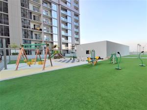 Fotografie z fotogalerie ubytování New 1 bedroom in Sobha - Community View v Dubaji