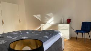 Un pat sau paturi într-o cameră la Chez Amis Gohlis