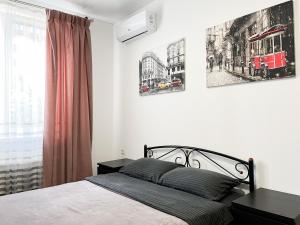מיטה או מיטות בחדר ב-054 Apartment Sofia Residence