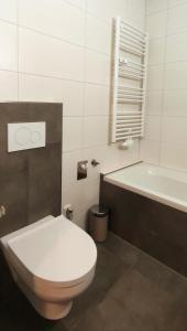 Kúpeľňa v ubytovaní Alpenappartements Domicil include Jokercard