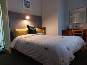 Cama ou camas em um quarto em Sea Air B&B