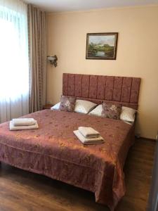 Łóżko lub łóżka w pokoju w obiekcie Villa Almira