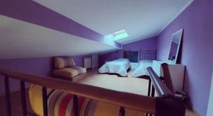 La Casa di Ale tesisinde bir odada yatak veya yataklar