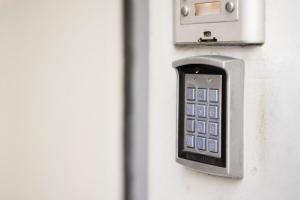 a remote control is attached to a wall at Bilkova Old Town Residence in Prague