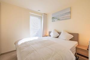 Postel nebo postele na pokoji v ubytování Sailorshouse + 5 fotografií