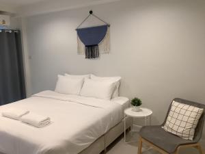 Letto o letti in una camera di IKKYU2 Angthong อิคคิว2