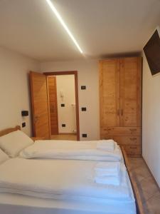 A bed or beds in a room at Casa Le Iscle
