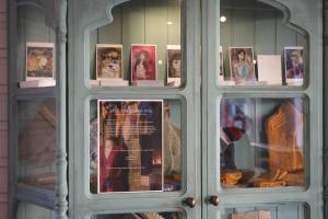 a display case in a store with pictures in it at 3ART recreation in Tromsø