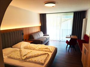 Postel nebo postele na pokoji v ubytování Hotel Tanja-Sonnenhof