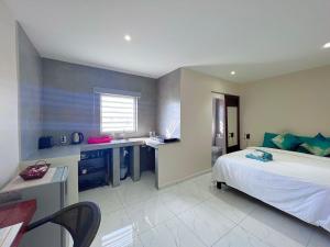 Postel nebo postele na pokoji v ubytování Boca Simon Vacation Curacao