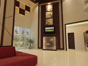 Televiisor ja/või meelelahutuskeskus majutusasutuses Hallmark Regency Hotel - Johor Bahru