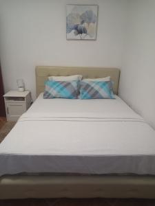Postel nebo postele na pokoji v ubytování Perovic 23
