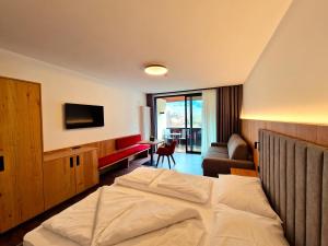 Postel nebo postele na pokoji v ubytování Hotel Tanja-Sonnenhof
