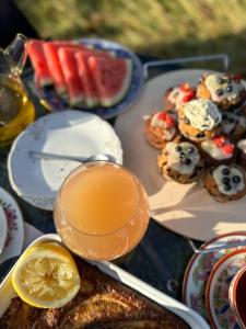a table with a plate of food with a slice of lemon at 3ART recreation in Tromsø